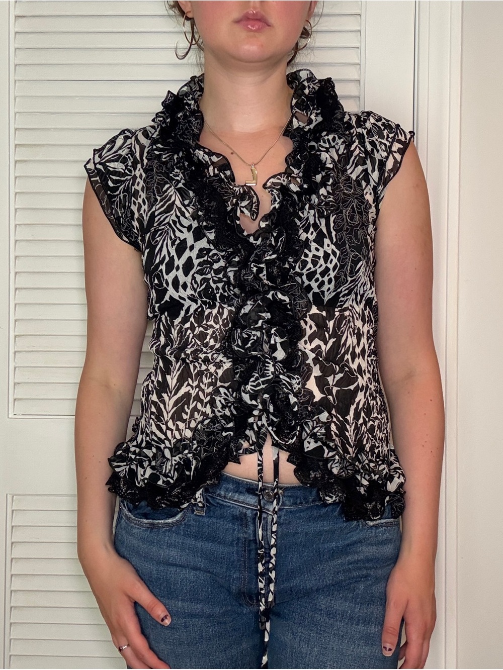 2000s style black & white abstract print ruffle blouse party concert date night